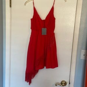 New with tags, never been worn, NBD, adjustable straps